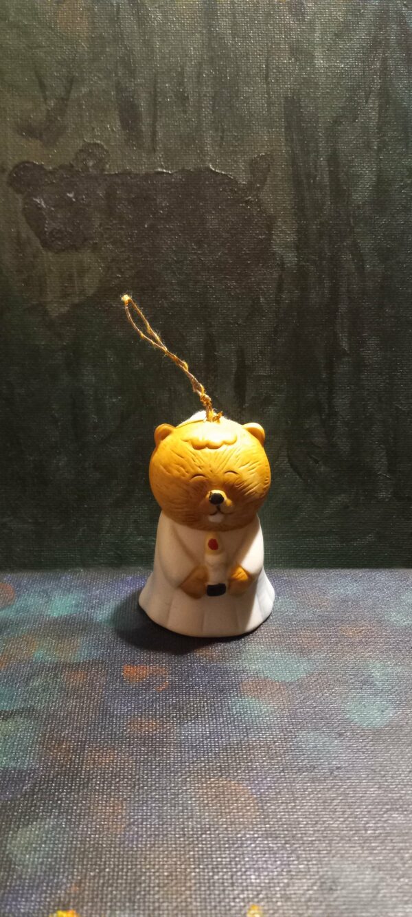 Beaver Holding Candle Bell